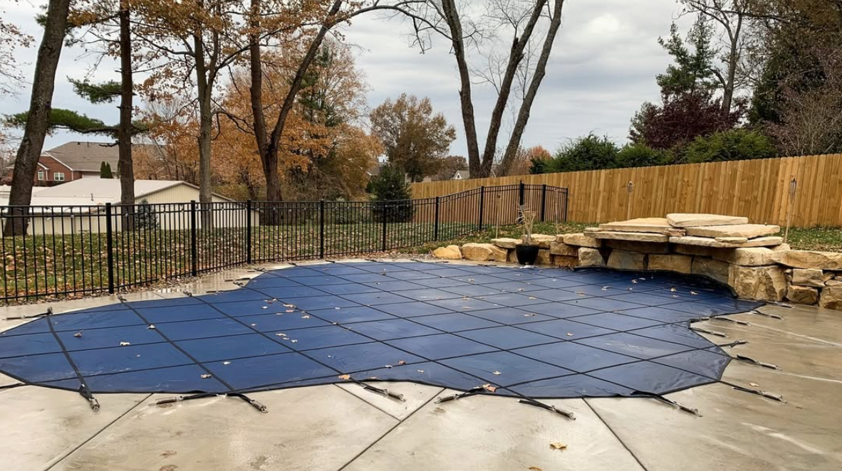 pool-cover-for-inground-pools Image showing a pool cover installed on an inground pool.