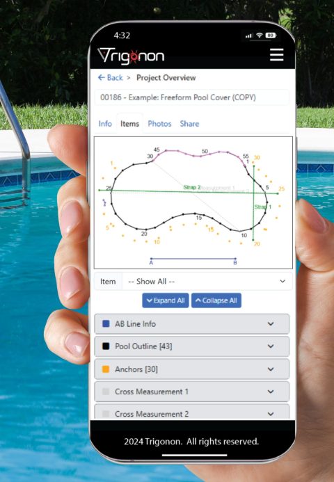 Image showing a cell phone being held near a pool that has an App made to get the best measurements of the homowners pool to get the best pool cover replacement