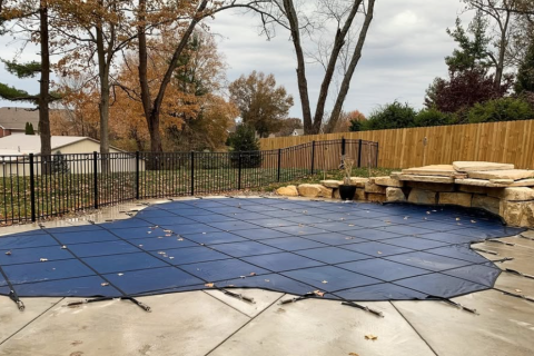 Image showing a pool cover installed nicely onto an inground pool