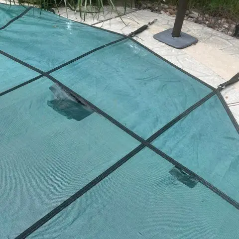 image showing bad seams in pool cover that a dog can fall through and be trapped